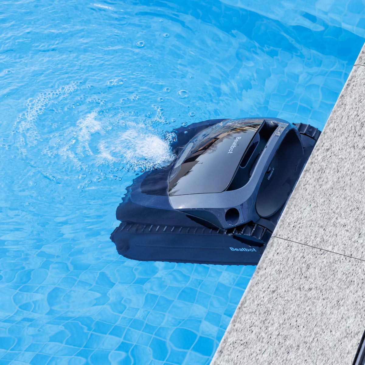 Beatbot AquaSense 2 cleaning along the pool wall