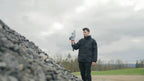 Operator scanning a gravel stockpile with the FJD Trion V4e Go