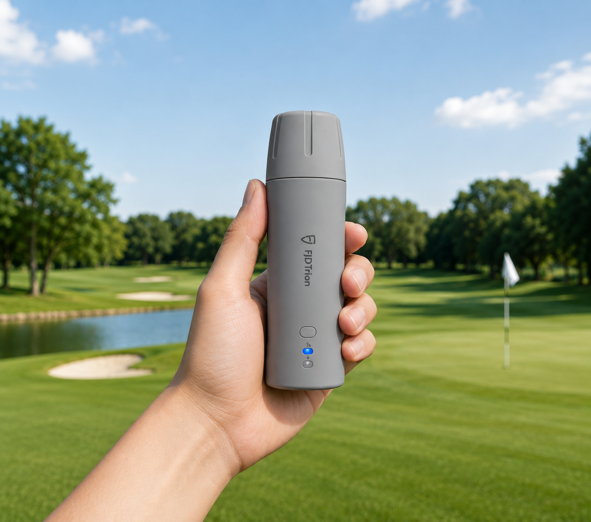 FJD Trion V4e Pro receiver held up on a golf course