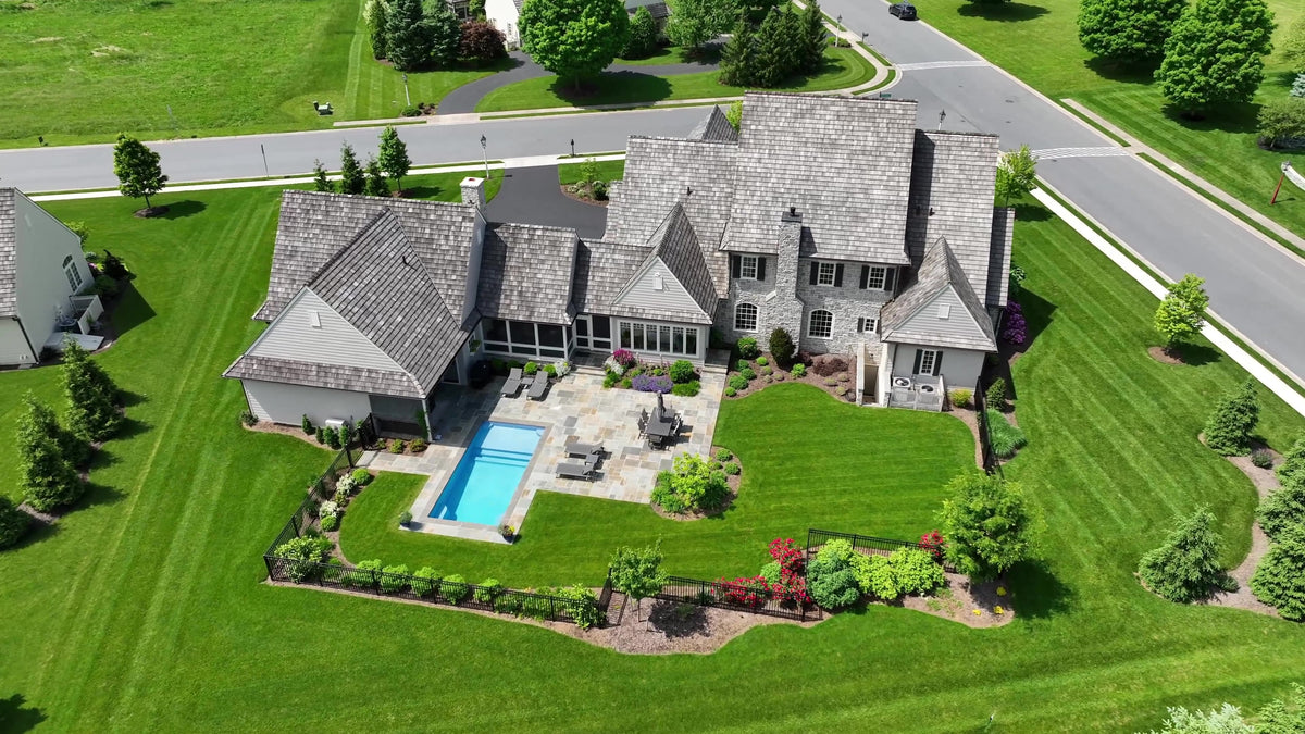 Aerial view of a home with lawn zones