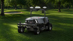 FJD Rough Ranger robotic mower on a golf course fairway with RTK antennas