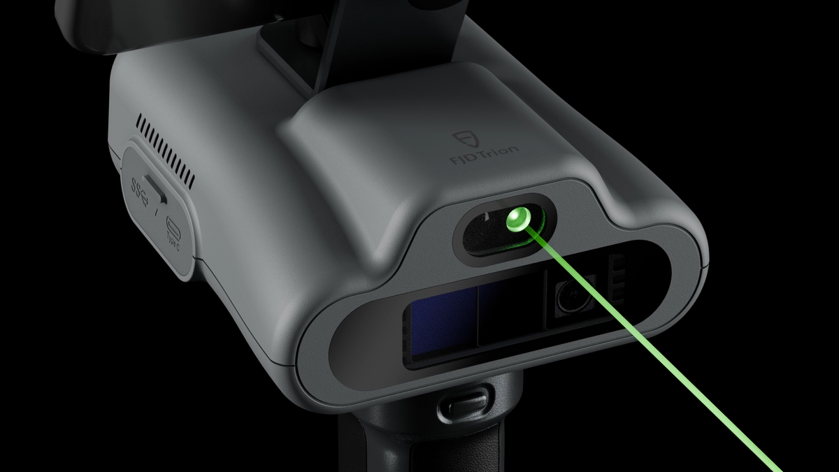 FJD Trion C1 built-in laser distance meter in use