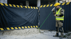 Surveyor staking out a point with the FJD Trion V4e Pro green laser