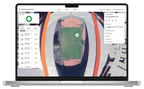 FJD GreenMaster fleet management platform showing a stadium map on a laptop