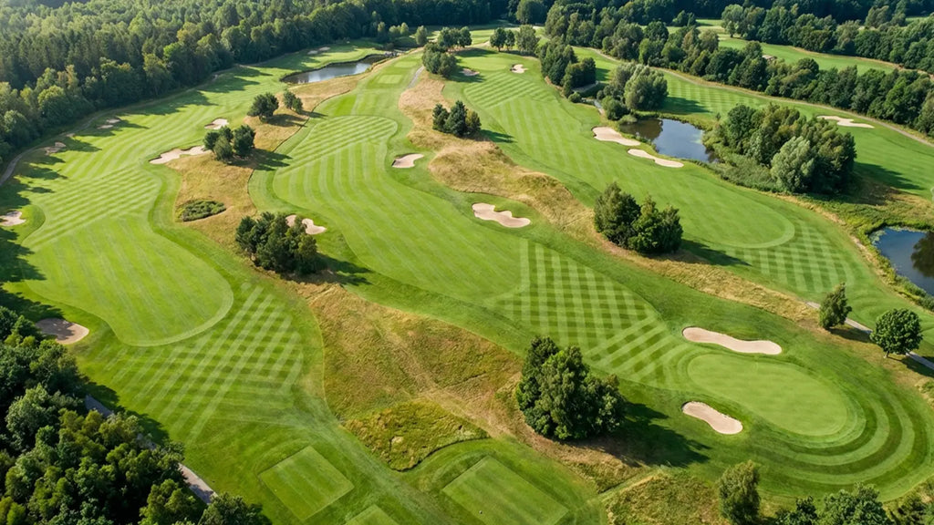 Aerial view of golf fairways with custom striping patterns