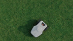 FJD FR4000 robotic mower on grass, top-down view
