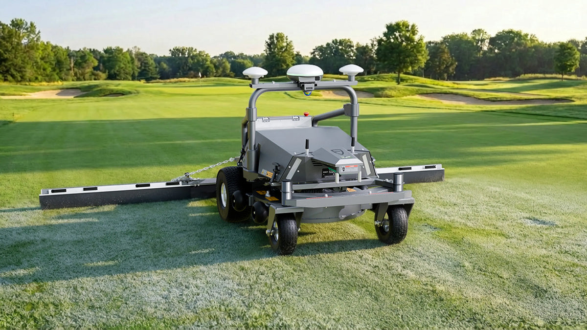 FJD robotic mower with DB01 dew brush kit on a golf course