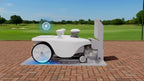 FJD Titan robotic mower docked on its auto-charging station