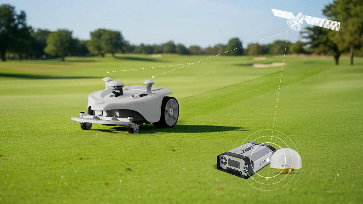 FJD Titan robotic mower with FJD RTK base station on a golf course
