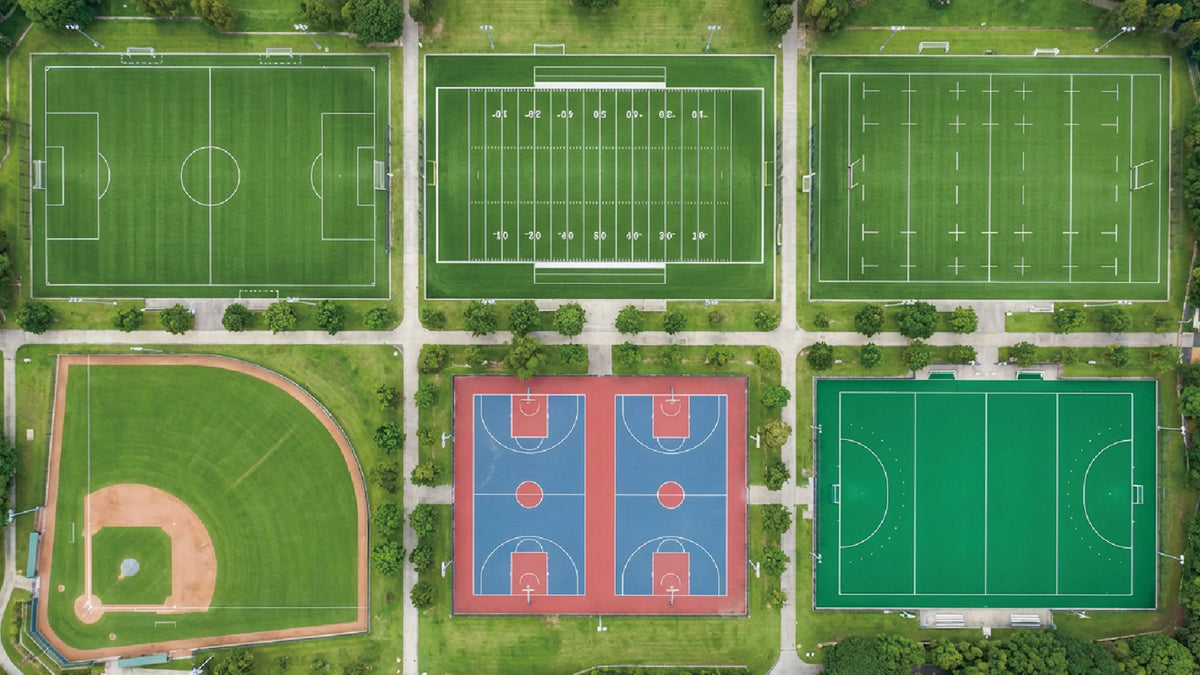 Aerial view of soccer, football, baseball and hockey fields ready for marking