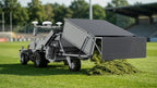 FJD robotic mower with GC01 grass collector kit unloading clippings on a sports field