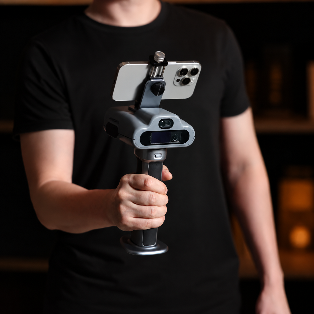 Person holding the FJD Trion C1 indoor LiDAR scanner