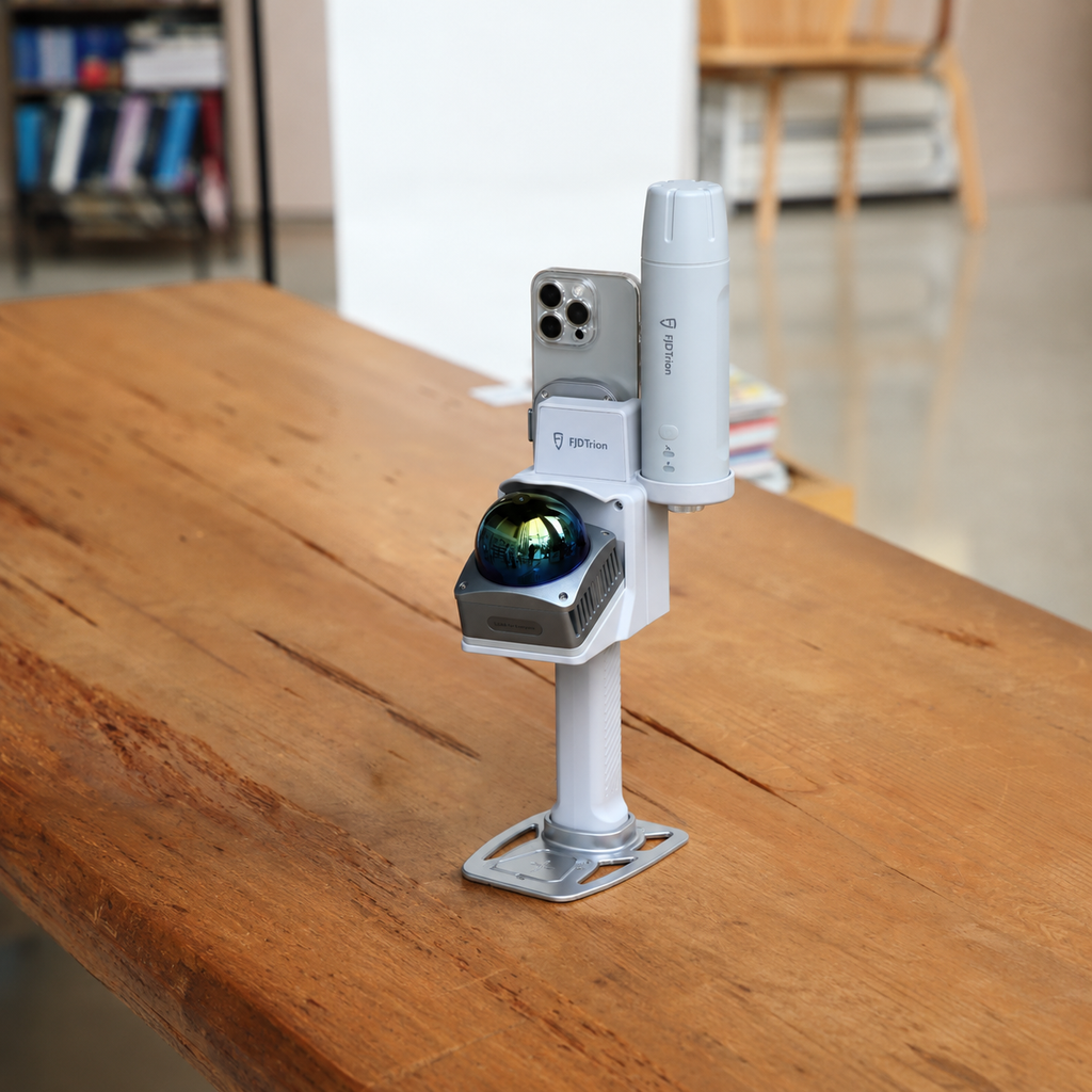FJD Trion V4e Go standing on a wooden table