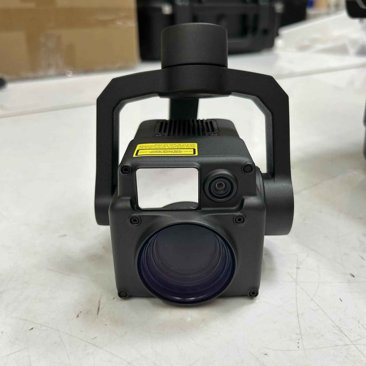 Open-box DJI Zenmuse H20 photographed on a workbench, front view