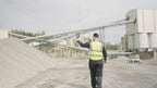 Operator scanning a material yard stockpile with the FJD Trion X1