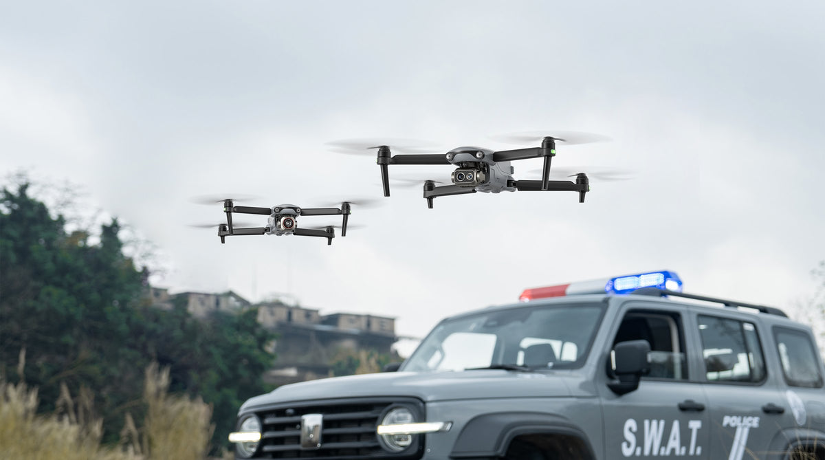 Autel EVO Lite Enterprise series drones flying over a police patrol vehicle