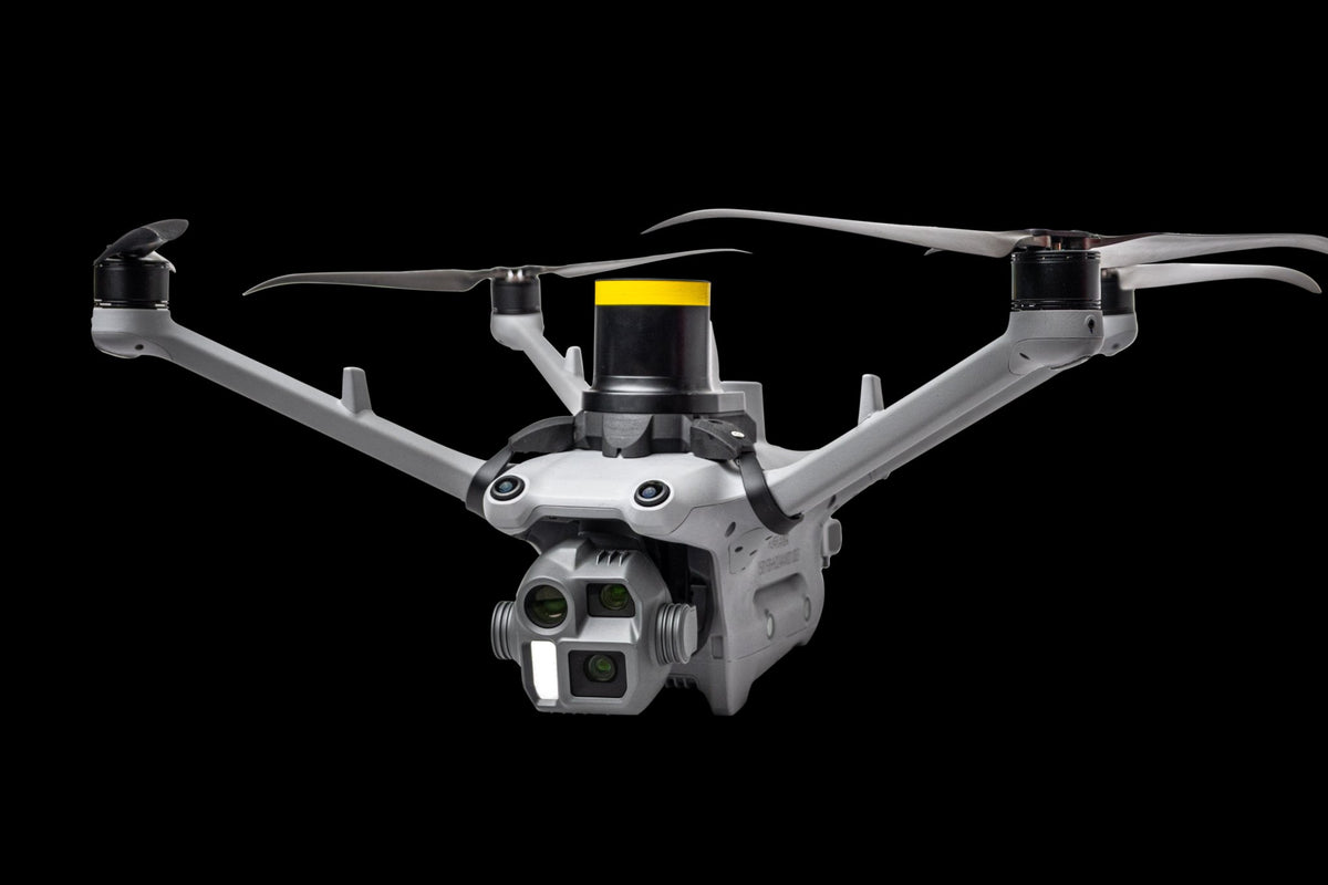 AVSS PRS-M4DT parachute recovery system installed on a DJI Matrice 4D, studio view