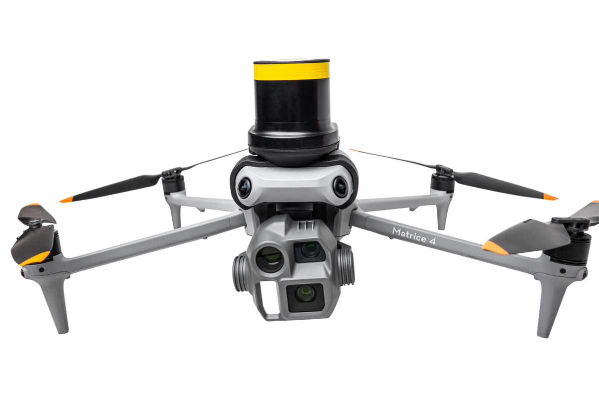 AVSS PRS-M4S parachute recovery system mounted on a DJI Matrice 4 Series drone, studio front view