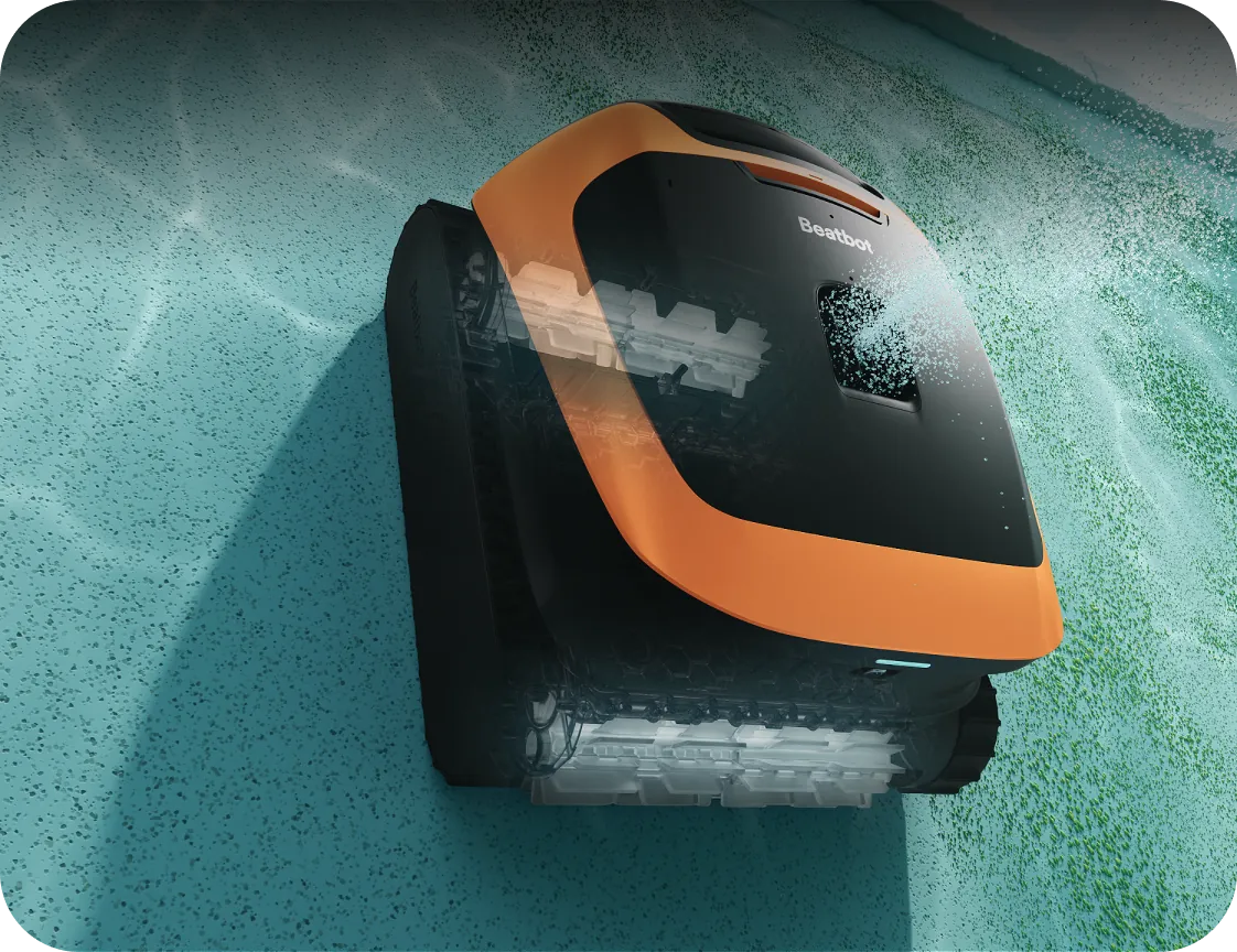 Beatbot Sora 30 pool cleaner scrubbing a pool floor covered in fine debris