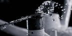 Water spraying over a DJI Matrice 4D series motor, showing IP55 water and dust resistance