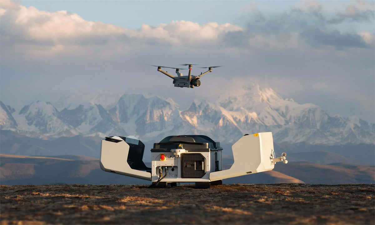 DJI Matrice 4D landing on an open DJI Dock 3 in the mountains