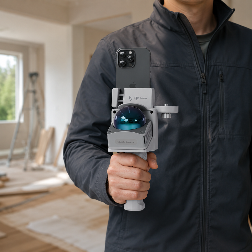 Person holding the FJD Trion V4e LiDAR scanner with a smartphone attached