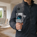 Person holding the FJD Trion V4e LiDAR scanner with a smartphone attached