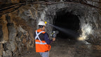 Mine worker scanning an underground tunnel with the FJD Trion T1