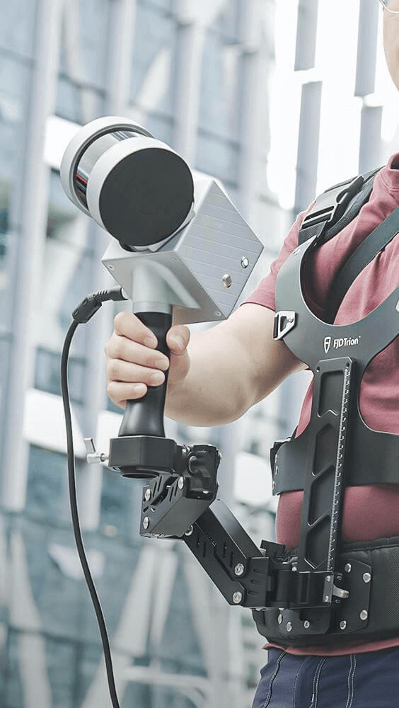 Operator using the FJD Trion S1 with the stabilizing vest
