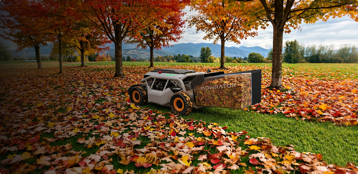 Mowrator S1 4WD grip tread vacuuming and shredding fall leaves into its collection bag with the mulching blade